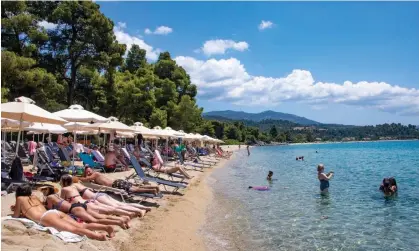  ?? Photograph: NurPhoto/Getty Images ?? A beach in the Sithonia peninsula, Halkidiki, Greece. Abta said strong demand for travel was expected to continue next year.