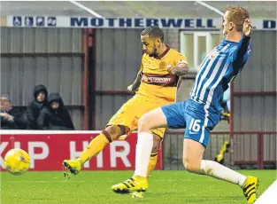  ??  ?? Lionel Ainsworth misses a good chance for Motherwell.