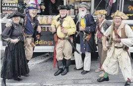  ?? CONTRIBUTE­D ?? Miller’s Kettle Corn serving some dastardly pirates at one of their many food truck stops.