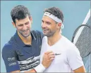  ?? AFP ?? Novak Djokovic (left) beat Grigor Dimitrov 7-6 (5), 6-4.