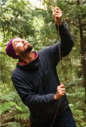  ??  ?? Using a narrow nylon parachute cord, Steve Pearce controls the custom-built camera assembly as it begins its vertical path.
Dan Haley prepares the ropes and climbing hardware that will take him safely up into the treetops and return him to the ground...