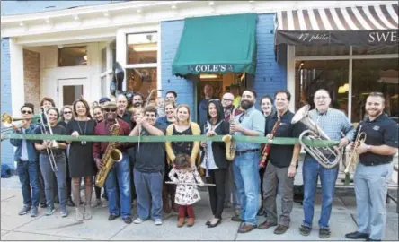  ?? PHOTO PROVIDED ?? Cole’s Woodwind Shop, located at 47 Phila St. in downtown Saratoga Springs, celebrates its 40th anniversar­y at a recent event with the Saratoga County Chamber of Commerce.