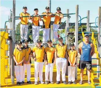  ?? ?? Blending in with the Domain playground Viking Ship the Dannevirke Sports Club Junior Cricket Squad with coach Jeff Ward, heading for Riverbend Camp on Wednesday.