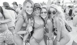  ??  ?? Thousands of music fans enjoy a day on the beach during the 2019 Tortuga Music Festival at Fort Lauderdale Beach.
MICHAEL LAUGHLIN/SOUTH FLORIDA SUN SENTINEL