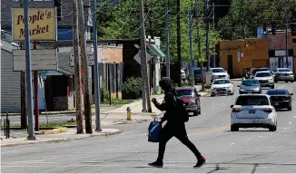  ?? MARSHALL GORBY / STAFF ?? Dozens of pedestrian strikes have occurred on North Main Street in the last seven years. Dayton and state officials hope that millions of dollars in infrastruc­ture upgrades will lead to fewer and less severe incidents.