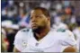  ?? BOB LEVERONE — THE ASSOCIATED PRESS FILE ?? This Nov. 13, 2017, file photo shows Miami Dolphins’ Ndamukong Suh (93) on the sidelines before an NFL football game against the Carolina Panthers in Charlotte, N.C.