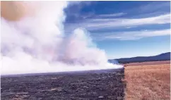  ?? COURTESY PHOTO ?? The Whitman Vega prescribed burn smolders in the Valle Vidal in 2016.