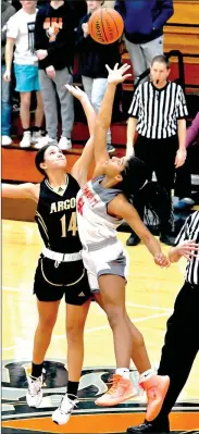  ?? PILOT PHOTO/RON HARAMIA ?? Argos and Culver tipped off for the third time this season, but Wednesday it was a sectional game. Jumping for Argos is Bella Stults and for Culver Amiyah Williams.