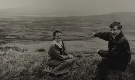  ??  ?? Chairperso­n of South West Kerry Developmen­t Organisati­on, Kathleen Lynch and Secretary Eamon Langford looking out over Coomanaspi­g valley in South Kerry where it is hoped to resettle city families.