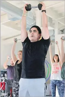  ?? Rachel Murray Getty Images for Ashley Borden Fitness & Lifestyle ?? REZA FARAHAN exercises in March during a session that he hosted with his trainer, Ashley Borden, to launch her fitness app.