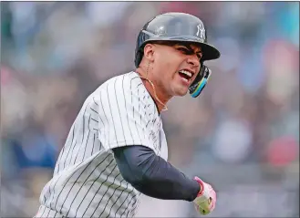  ?? SETH WENIG/AP PHOTO ?? Gleyber Torres of the New York Yankees reacts after hitting a walk-off home run during the ninth inning of the first game of a doublehead­er against the Texas Rangers on Sunday at Yankee Stadium.