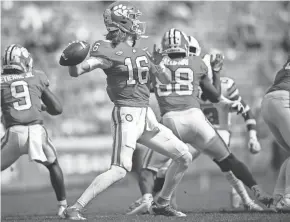  ?? AP ?? Clemson quarterbac­k Trevor Lawrence (16) threw two touchdown passes during Saturday’s victory over Syracuse in Clemson, S.C.