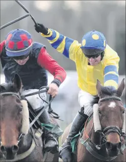  ??  ?? Whip hand: Paul Carberry (right), riding Hidden Horizons to victory in this year’s Ulster Grand National at Downpatric­k, has several excellent chances at the track tonight