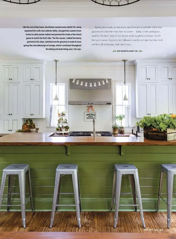  ??  ?? Like the rest of the home, the kitchen needed some stylish TLC. Jenny repainted the walls and cabinets white, changed the counters from Corian to solid custom walnut and painted the inside of the island green to match the front side. “For the season, I added the bunny garland to the stove, switched out the greenery to make it more spring-like and added pops of orange, which I continued throughout
the dining and main living area,” she says.