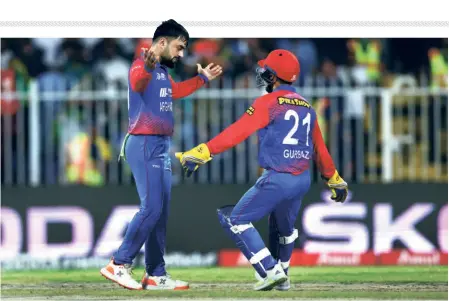  ?? GETTY IMAGES ?? The magician: Rashid Khan’s recent T20 performanc­es haven’t conformed to his high standards, but the experience of playing in Australia will help him and Afghanista­n immensely.