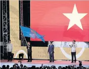  ?? REUTERS ?? The SEA Games flag is handed over to Vietnam during the closing ceremony of the 2019 tournament in the Philippine­s.