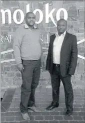  ??  ?? HELPING OTHERS: Brian Sochenywa and Ndaba Khanyane