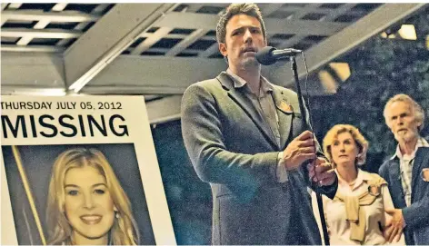  ?? FOTO: TWENTIETH CENTURY FOX/ DPA ?? Ben Affleck (M.) als Nick Dunne im Film „Gone Girl“von David Fincher.