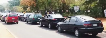  ?? Photo: Hamisu Muhammad ?? Petrol queue at NNPC Mega Stataion at Central Business District in Abuja yesterday