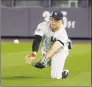  ?? Seth Wenig / Associated Press ?? New York Yankees right fielder Aaron Judge makes a diving catch during the third inning of Game 1 of the American League Division Series in October.