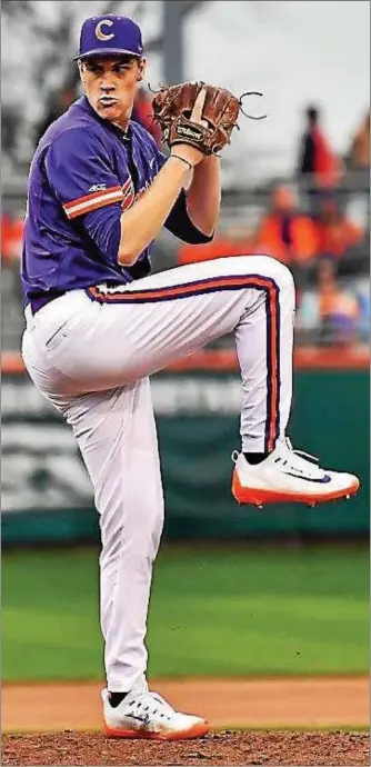  ?? PHOTO COURTESY CLEMSON UNIVERSITY ?? Pitcher and Downingtow­n West graduate Pat Krall delivers during a game for Clemson University. Krall is likely to join the Oakland Athletics’ short-season affiliate in Vermont.