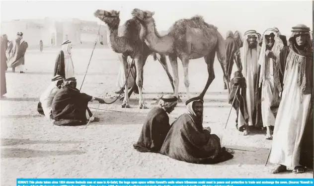  ??  ?? KUWAIT: This photo taken circa 1924 shows Bedouin men at ease in Al-Safat; the huge open space within Kuwait’s walls where tribesmen could meet in peace and protection to trade and exchange the news. (Source: ‘Kuwait in the Eyes of Early Photograph­ers,’ William Facey, Gillian Gran, London, 1989. Prepared by: Mahmoud Aakaria Abu Alella, researcher in heritage, Ministry of Informatio­n)