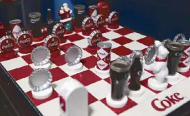  ??  ?? Checkmate: Coca-Cola chessboard complete with chess pieces