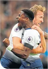  ??  ?? Harry Kane celebrates with Tottenham Hotspur team-mate Serge Aurier