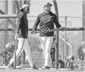  ?? AL DIAZ adiaz@miamiheral­d.com ?? Center fielder Jazz Chisholm Jr., left, and second baseman Luis Arraez at batting practice Tuesday in Jupiter.