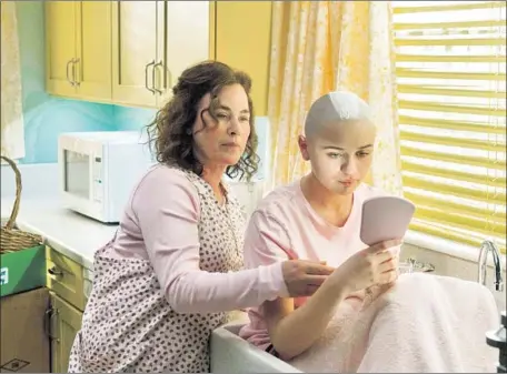  ?? Brownie Harris Hulu ?? PATRICIA ARQUETTE, left, plays Dee Dee Blanchard and Joey King is daughter Gypsy Rose in the true-crime Hulu series “The Act.”