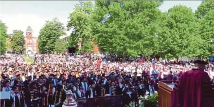  ?? REUTERS PIC ?? Students cheering after billionair­e investor Robert Smith pledged to pay off the student loan debt of the entire class of 2019 at Morehouse College in Atlanta, Georgia, on Sunday.