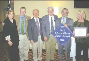  ?? Courtesy photo ?? From left, CSWCD Director Evelyn Kerr; Del. Michael Webert; Rappahanno­ck County supervisor­s Mike Biniek and Christophe­r Parrish and 2012 Bay-Friendly Award recipients Larry and Kathy Grove.