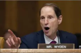  ?? CAROLYN KASTER — THE ASSOCIATED PRESS FILE ?? Sen. Ron Wyden speaks during a committee hearing on Capitol Hill in Washington. For the first time, the U.S. government is publicly acknowledg­ing the existence in Washington of what appear to be rogue devices that foreign spies and criminals could be...