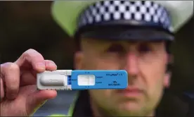  ??  ?? TEST KIT: Police check for cannabis and cocaine with DrugWipe mouth swab