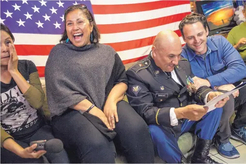  ?? JOEL ANGEL JUAREZ/ASSOCIATED PRESS ?? Deported mother Yolanda Varona, left, Norma Chavez-Peterson of the ACLU of San Diego, Hector Barajas-Varela, a deported U.S. Army veteran, and his attorney Nathan Fletcher react after an announceme­nt stating that Barajas-Varela received American...