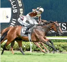  ?? RACE IMAGES NI ?? Winning rider Ryan Elliot salutes as Levante wins the Telegraph at Trentham yesterday.