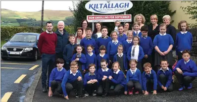  ?? Photo by Michelle Cooper Galvin ?? Cllr John Francis Flynn with John Joe Ladden, Principal Paula Ní Bhrian, teacher Caroline Cronin, SNA Deirdre O’Sullivan, parents Colette Boyle, Katie and Jerry O’Neil, Alison Flaherty, Sinead O’Shea and some of the pupils at Kiltallagh National...