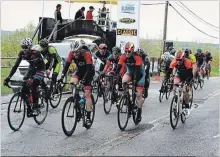  ?? KRIS DUBE
SPECIAL TO THE WELLAND TRIBUNE ?? Some of about 300 cyclists are shown participat­ing in the Steve Bauer Classic in Pelham on Saturday.