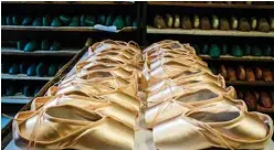  ??  ?? A picture taken at Grishko company shows pointe shoes in the company’s Moscow workshop. — AFP photos