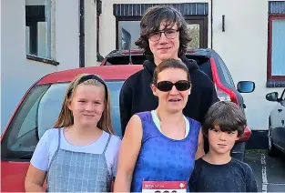  ??  ?? Chew Valley 10k runner Jane Wookey and family who ran in memory of husband Mark raising funds for Lymphoma Research Trust