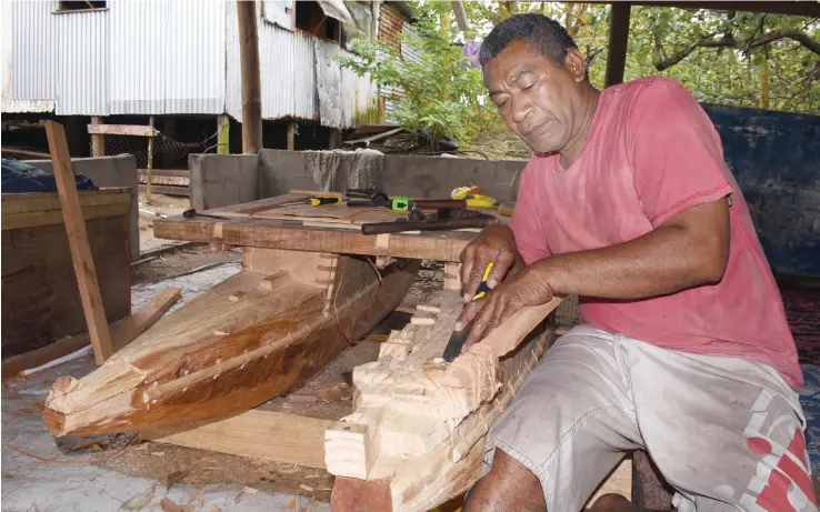  ?? Photo: Ronald Kumar ?? Setereki Domonisera carving a double hulled canoe (Drua-for display), which will be displayed by Fiji during COP23, in Bonn, Germany next month.