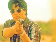 ??  ?? Benicio del Toro en el papel del policía de frontera en “Traffic”. Con él ganó el Óscar en 2000.