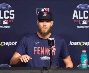  ?? Tony Gutierrez / Associated Press ?? Red Sox pitcher Chris Sale responds to questions during a news conference before practice in Houston on Thursday.