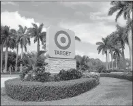  ?? AP/WILFREDO LEE ?? The entrance for a Target store in North Miami Beach, Fla., is seen in this Wednesday photo. Target shares closed at $55.04, up nearly 1 percent in New York trading Wednesday, but they’re still down more than 24 percent for the year.