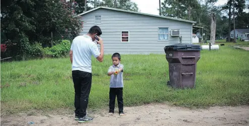  ??  ?? Adonias refuses to speak to his grandfathe­r, who is calling from Guatemala. “No gracias,” he tells his father.