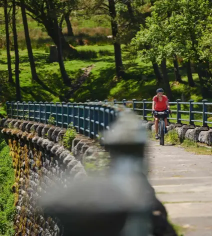  ??  ?? RIGHT Cycling around the Grwyne Fawr reservoir, a water source for the Welsh Valleys since 1928