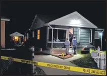  ??  ?? THE MURDER SCENE Salt Lake City police investigat­ors gathered evidence from the crime scene. A neighbour reported seeing flames and smoke coming from Ajayi’s back garden – and a smell like nothing she had smelled before.