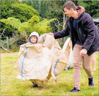  ??  ?? Enjoying the sack race at Battle Hill Farm Day.