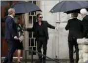  ?? ORLIN WAGNER — THE ASSOCIATED PRESS ?? Actor-comedian David Spade helps family members enter Our Lady of Perpetual Help Redemptori­st Catholic Church for funeral services for his sister-in-law, designer Kate Spade, in Kansas City, Mo., Thursday.