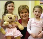  ??  ?? NICOLA STURGEON: Meets the Baby Ballet class at the Oxgangs Neighbourh­ood Centre, Edinburgh.